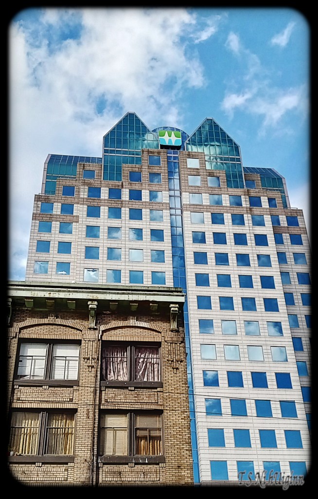 Clouds reflecting on bc hydro building by by Salish photographer TS Ni hUiginn